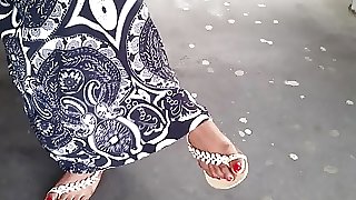 Indian mature feet with red nails