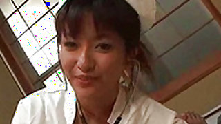 Beauty japanese nurse with cute smile is sucking erection